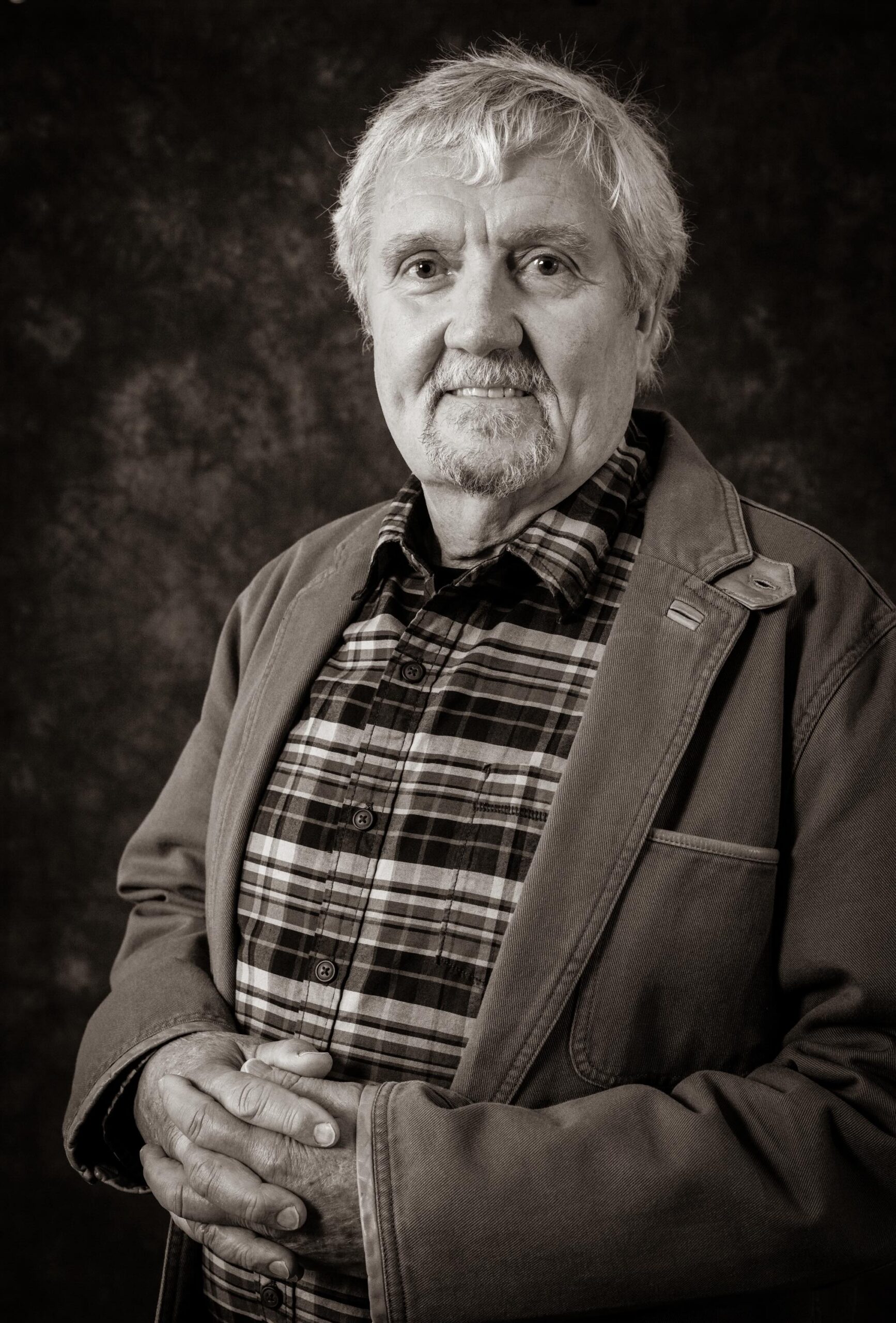 Dr. Matthew Gilligan stands for a portrait